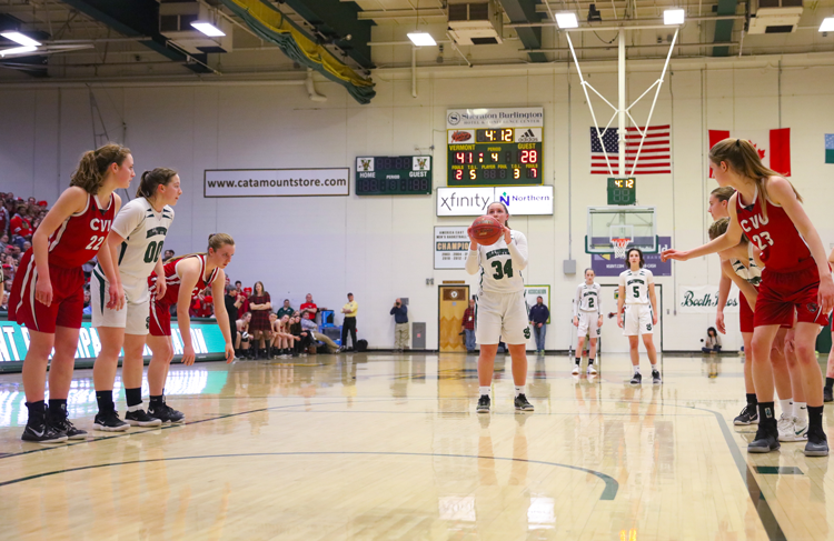 SJA girls' basketball team in action