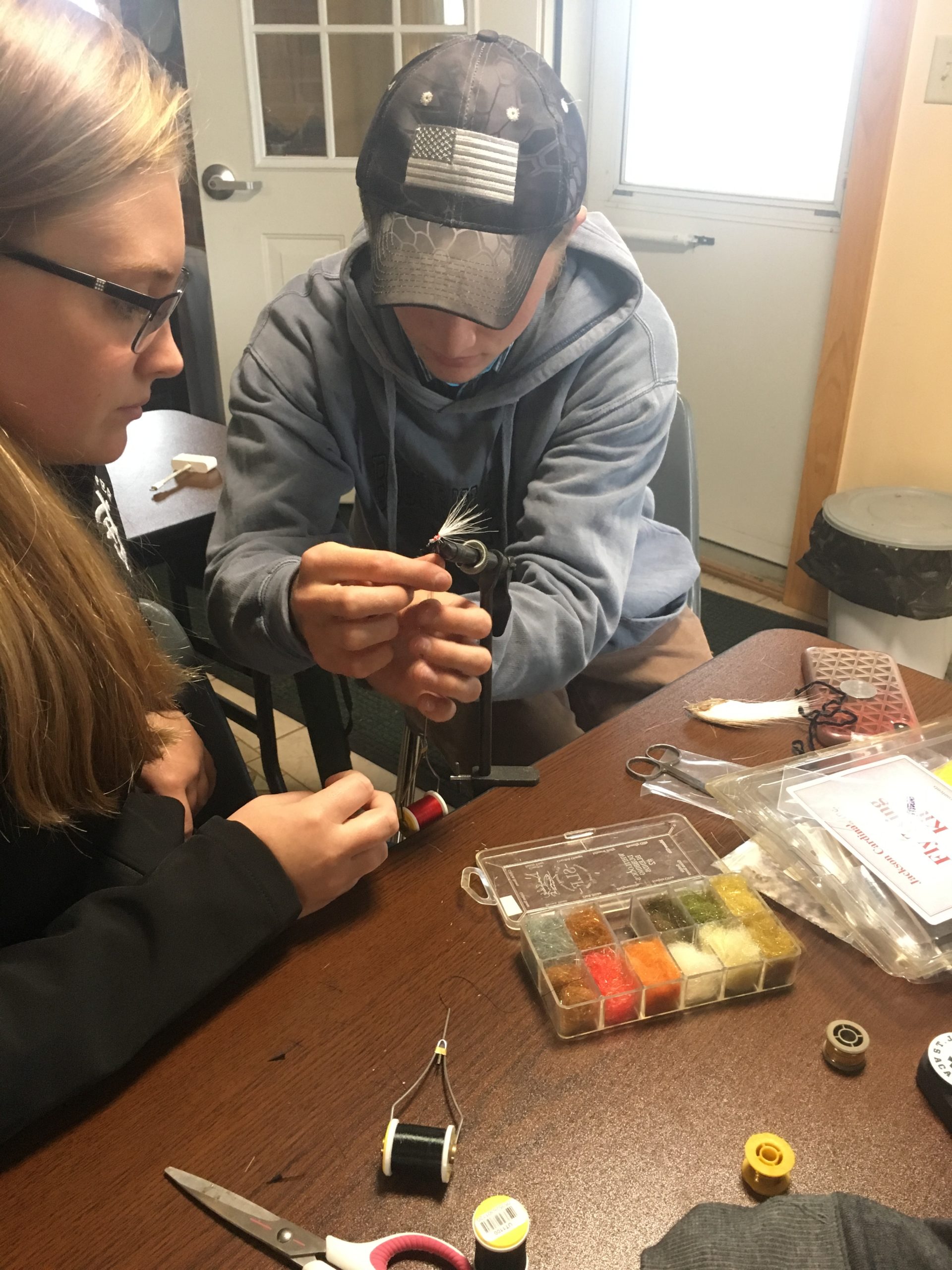 Students preparing lures