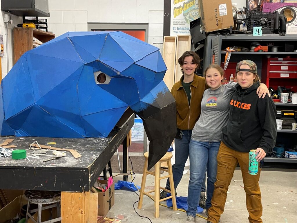 Students show off their float