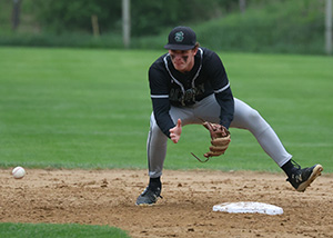 boy playing baseball