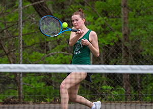 girl playing tennis