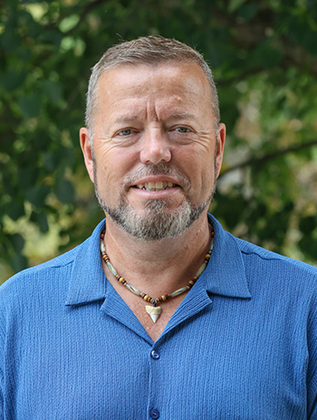 A man posing for a staff photo.