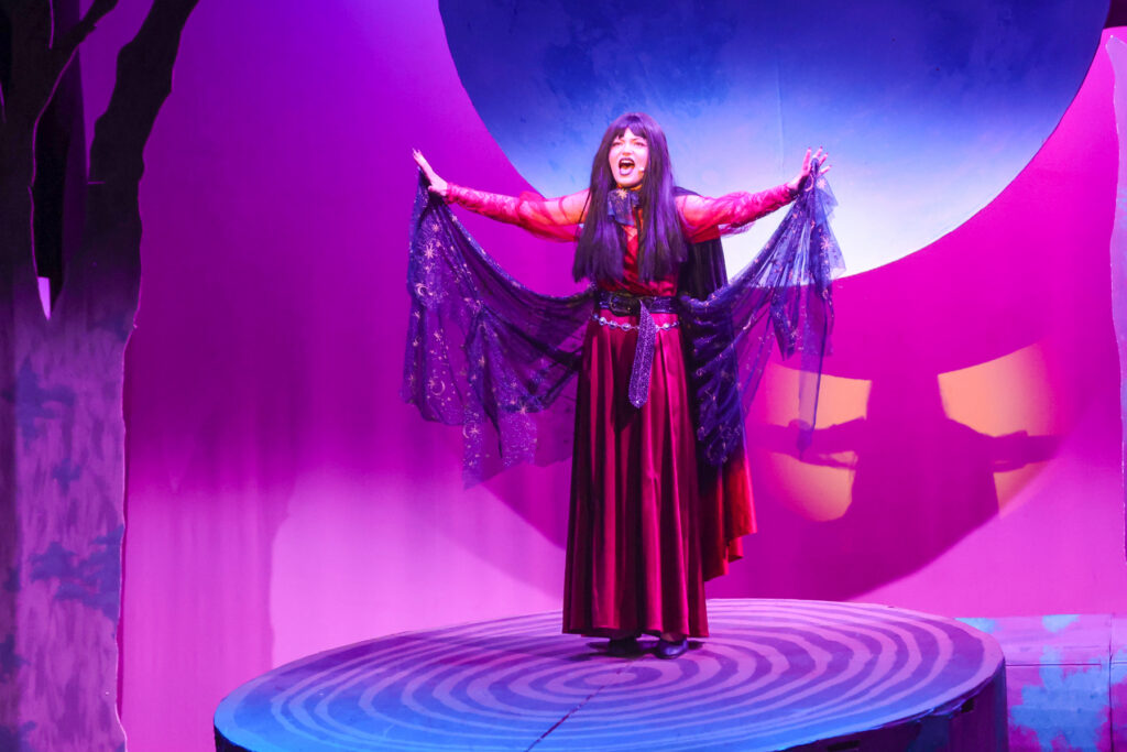 Student performing during a musical.
