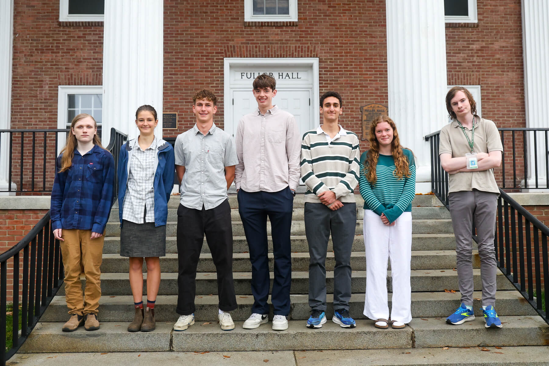 Seniors stand on Fuller Hall steps.
